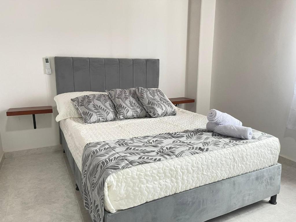 Postel nebo postele na pokoji v ubytování Casa Hotel Estelar