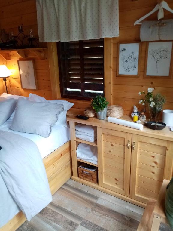 Postel nebo postele na pokoji v ubytování NIKOLIJA 2