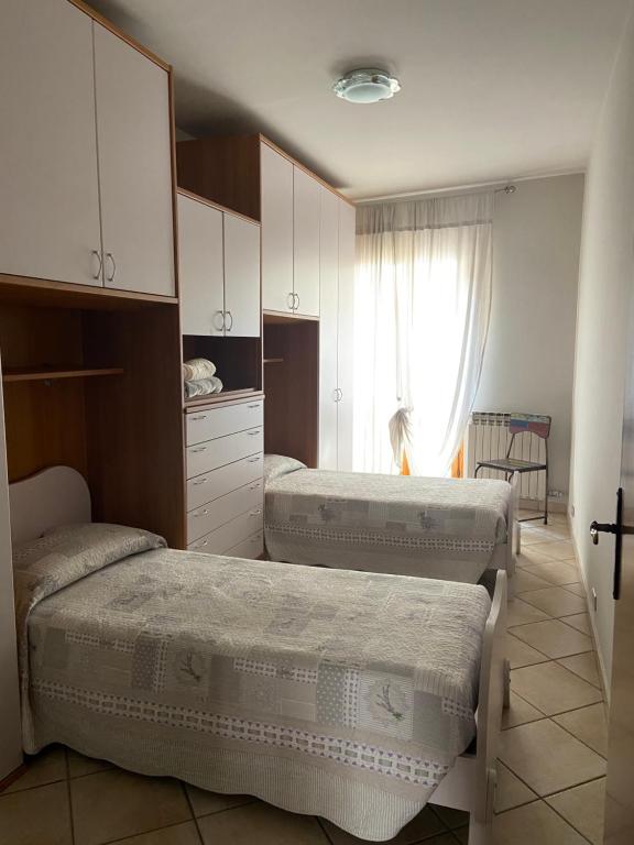 Posteľ alebo postele v izbe v ubytovaní Casa Luisini