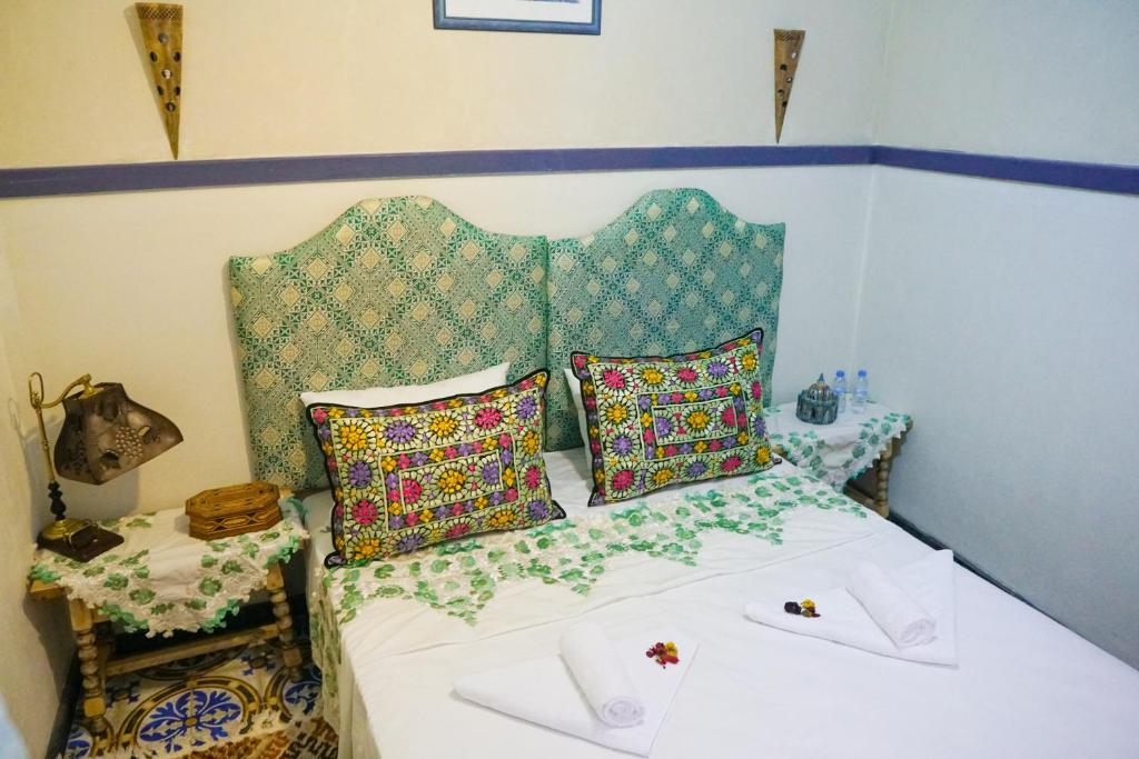 Postel nebo postele na pokoji v ubytování Winarouze house