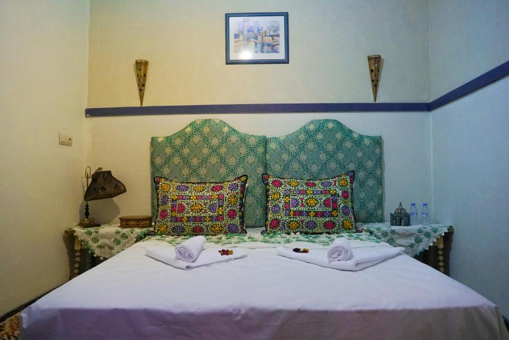 Postel nebo postele na pokoji v ubytování Winarouze house