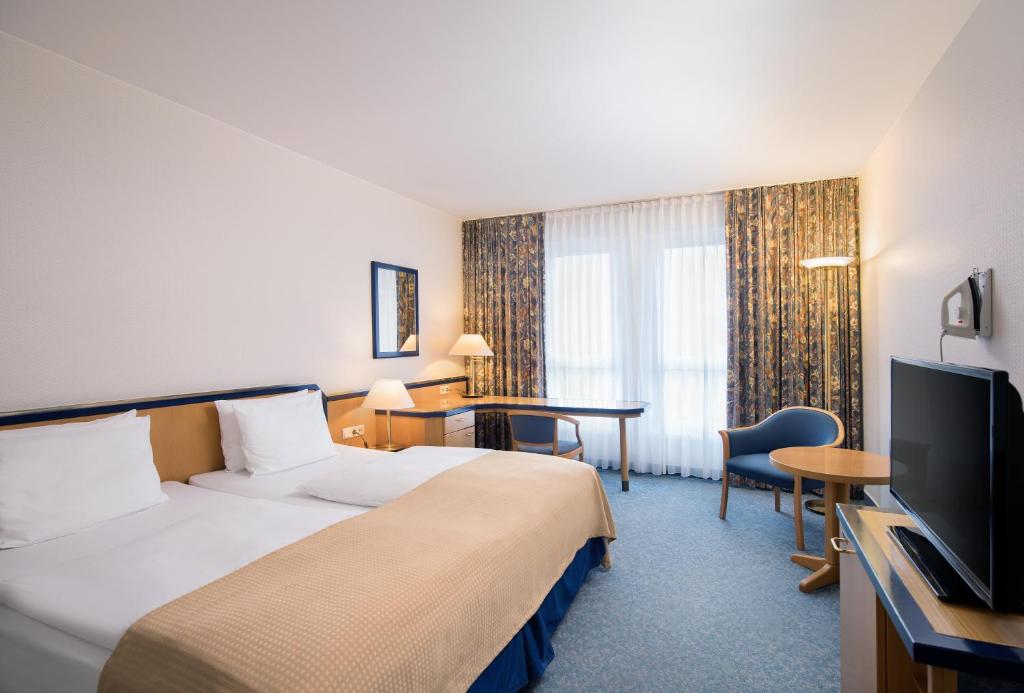 TV a/nebo společenská místnost v ubytování HI Hotel International Hamburg