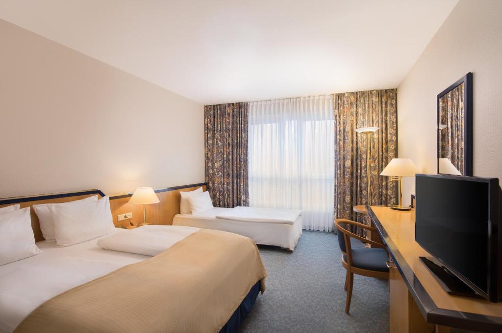 TV a/nebo společenská místnost v ubytování HI Hotel International Hamburg