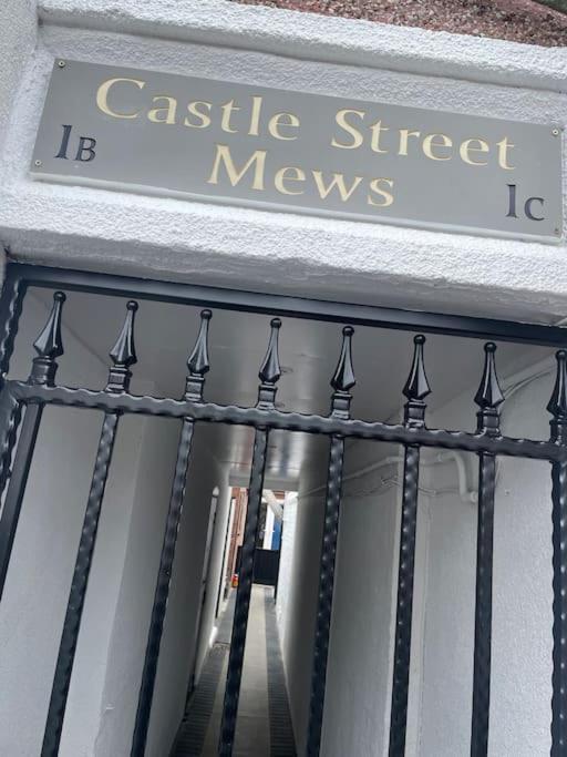 a sign that reads castle street movies on a building at Castle St Mews of Southport - 2 bed townhouse in Southport