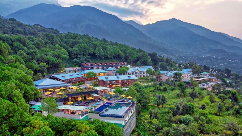 an aerial view of a resort in the mountains at Radisson Blu Resort Dharamshala in Dharamshala