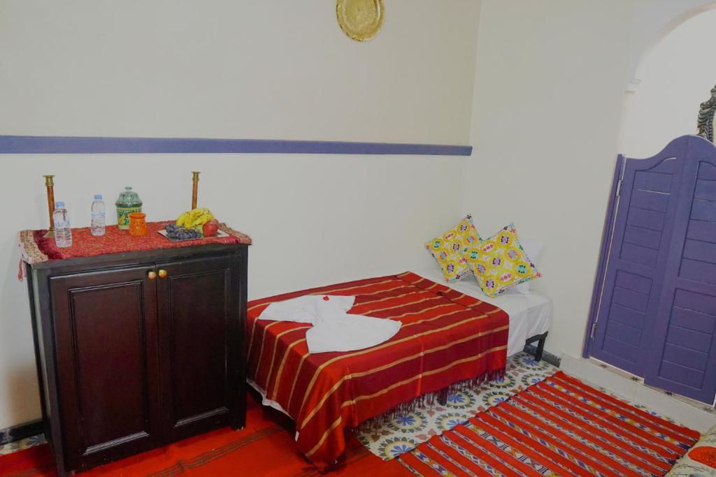 Postel nebo postele na pokoji v ubytování Winarouze house