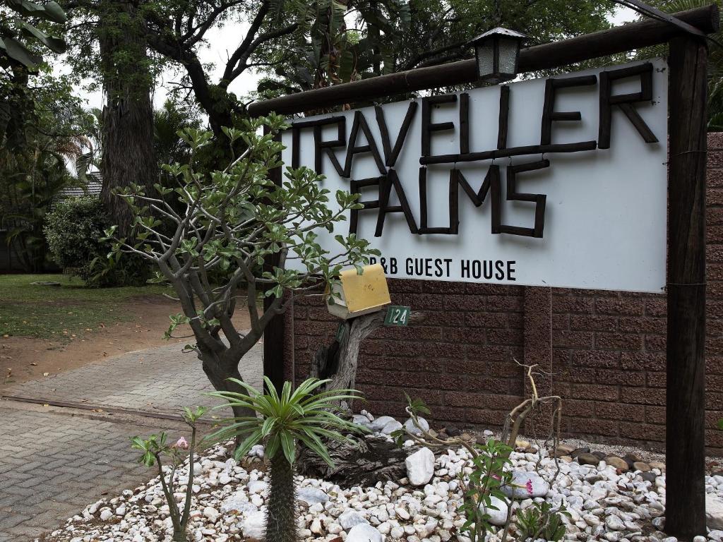 a sign for a flyler jamhibitedhibitedhibitedhibitedhibitedhibitedhibitedhibitedhibited at A Traveller's Palm in Phalaborwa