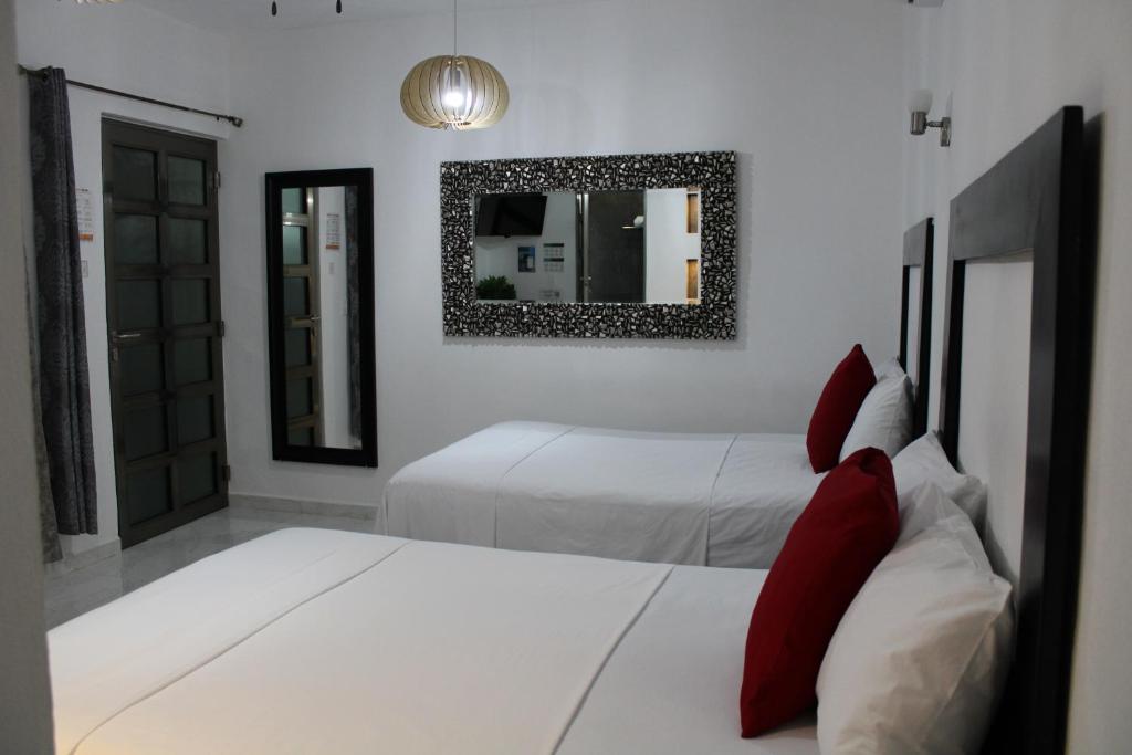 Postel nebo postele na pokoji v ubytování Casa Zazil