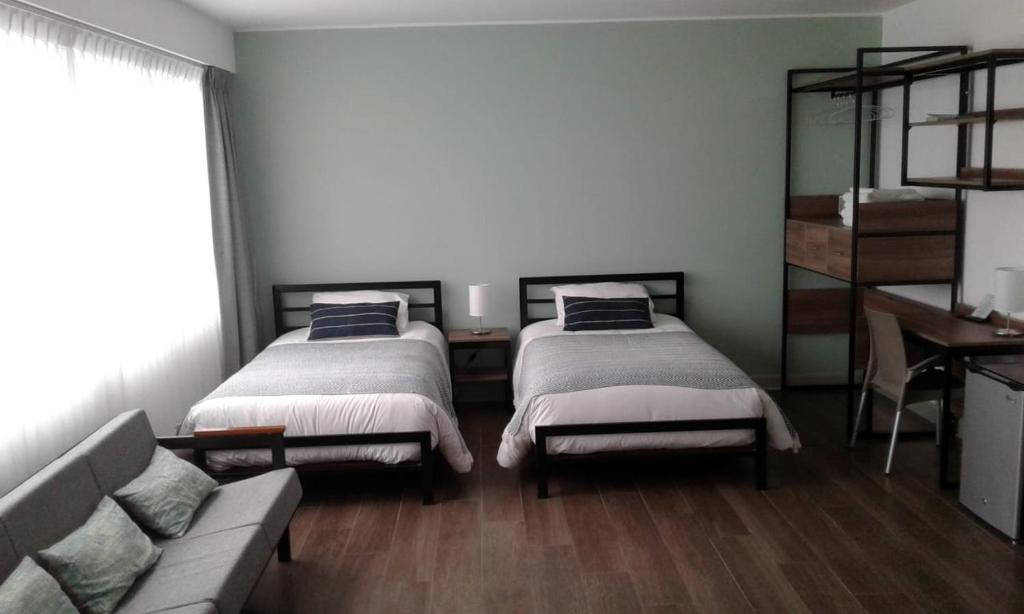 Postel nebo postele na pokoji v ubytování NEREO rooms