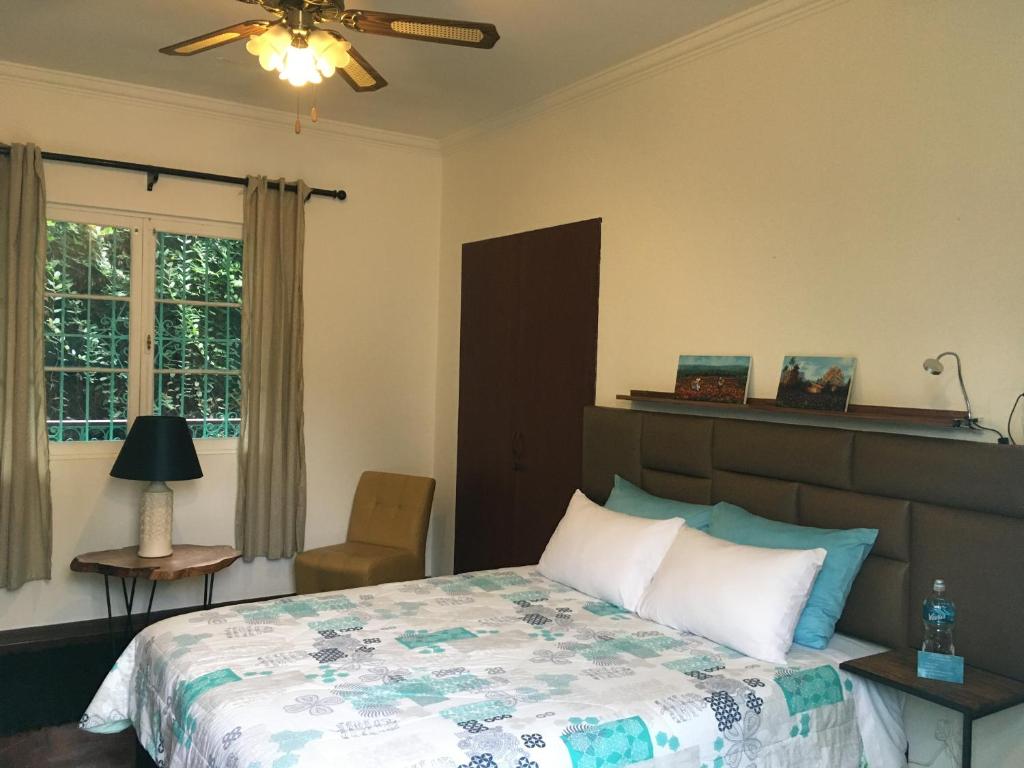 Postel nebo postele na pokoji v ubytování La Casona Azul