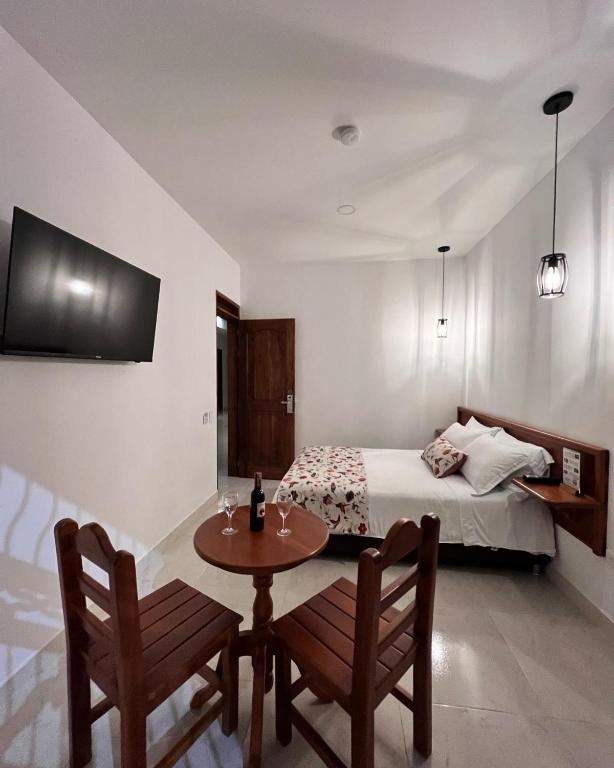 TV a/nebo společenská místnost v ubytování Casa Isabel Hotel