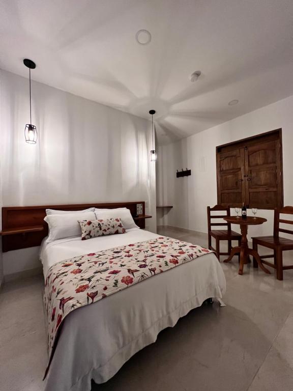 Postel nebo postele na pokoji v ubytování Casa Isabel Hotel