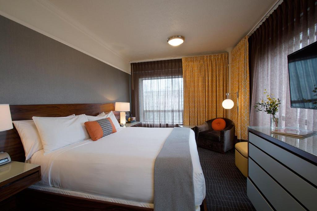 Postel nebo postele na pokoji v ubytování Hotel Lucia