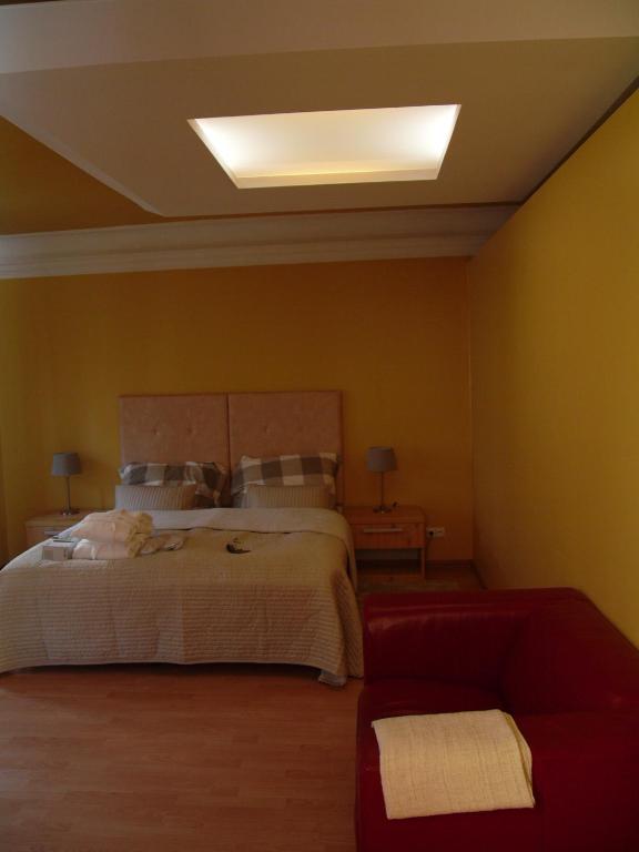 Posteľ alebo postele v izbe v ubytovaní Apartments and Suites Kremnica