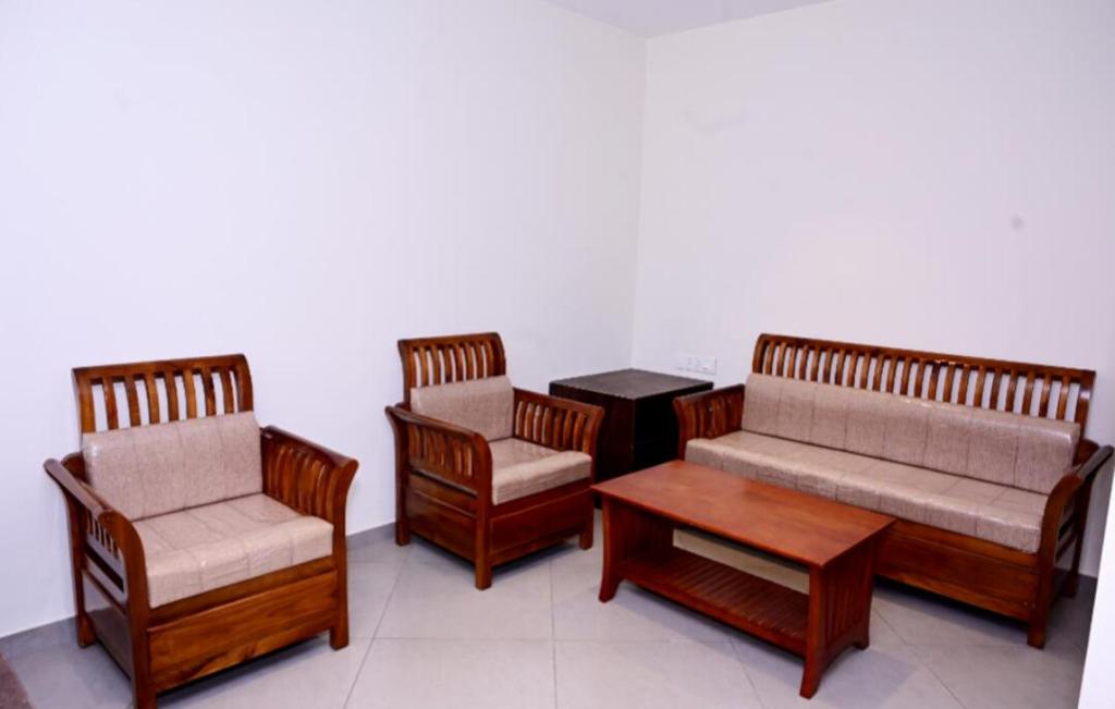 Posezení v ubytování Coorg Vismaya Resort
