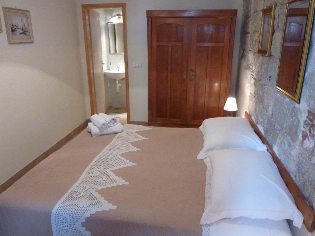Posteľ alebo postele v izbe v ubytovaní Authentic Mediterranean Apartment
