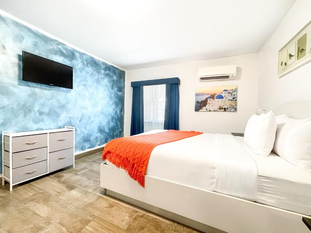 Postel nebo postele na pokoji v ubytování Casa Pellegrino Boutique Hotel