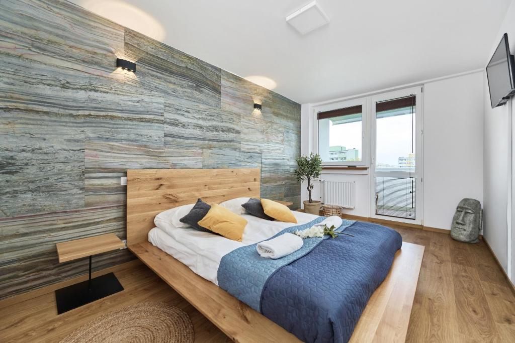 Posteľ alebo postele v izbe v ubytovaní Stylish Kwiska Apartment Wrocław by Noclegi Renters