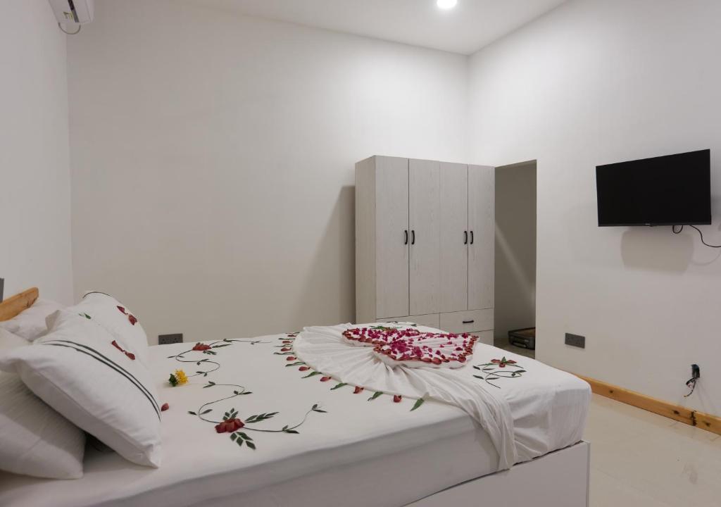 Postel nebo postele na pokoji v ubytování Splendour Grand