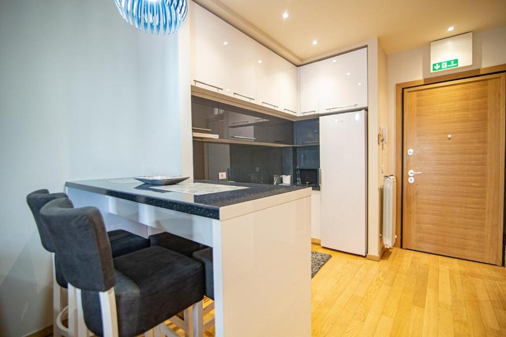 Kuchyň nebo kuchyňský kout v ubytování Apartman Oaza Kalman SPA-GYM