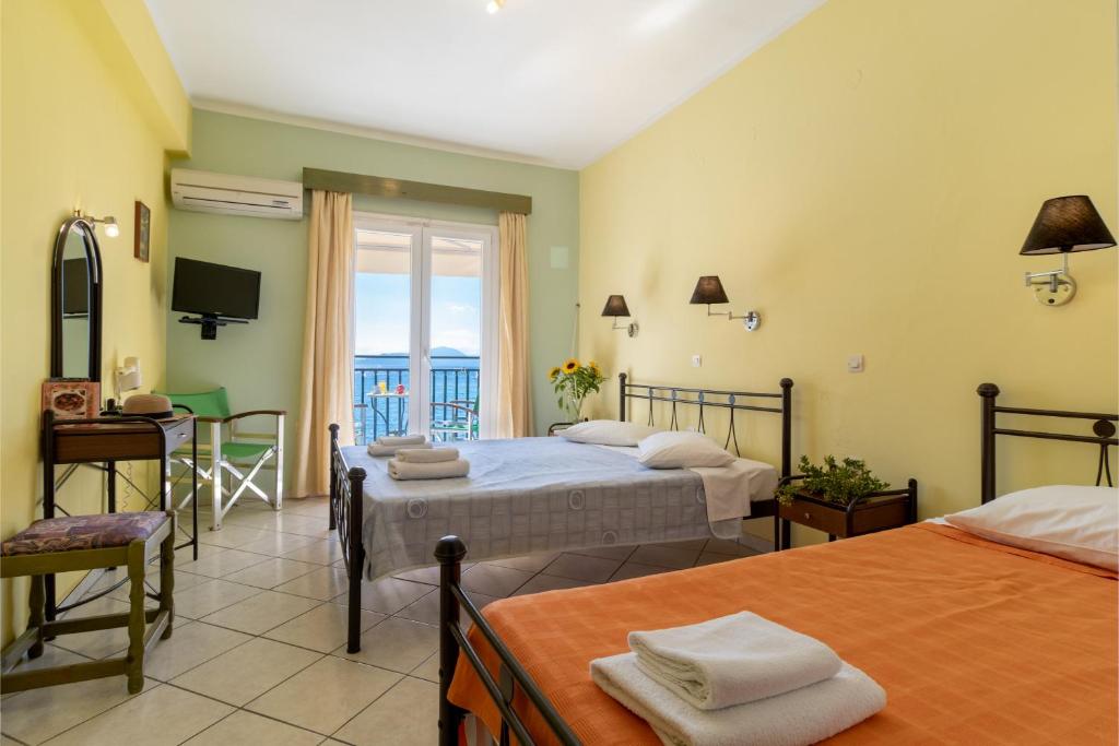 Postel nebo postele na pokoji v ubytování Apostolos Apartment 1