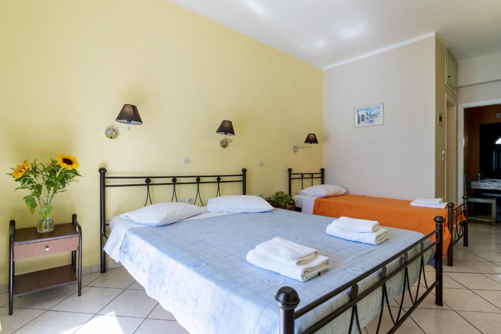 Postel nebo postele na pokoji v ubytování Apostolos Apartment 1