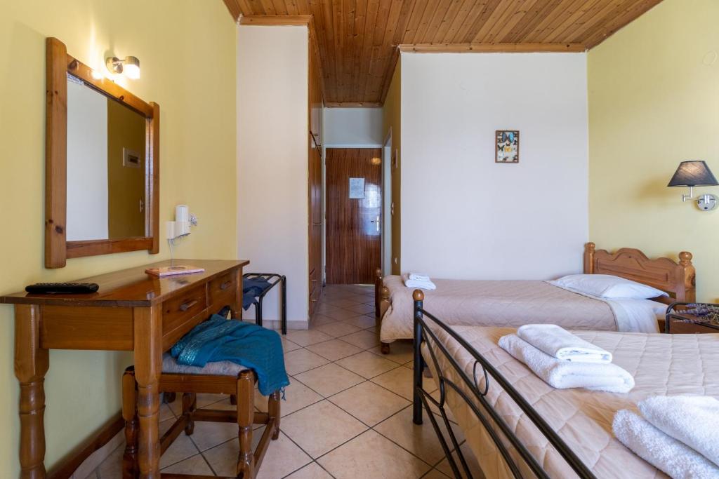 Posteľ alebo postele v izbe v ubytovaní Apostolos Apartment 6
