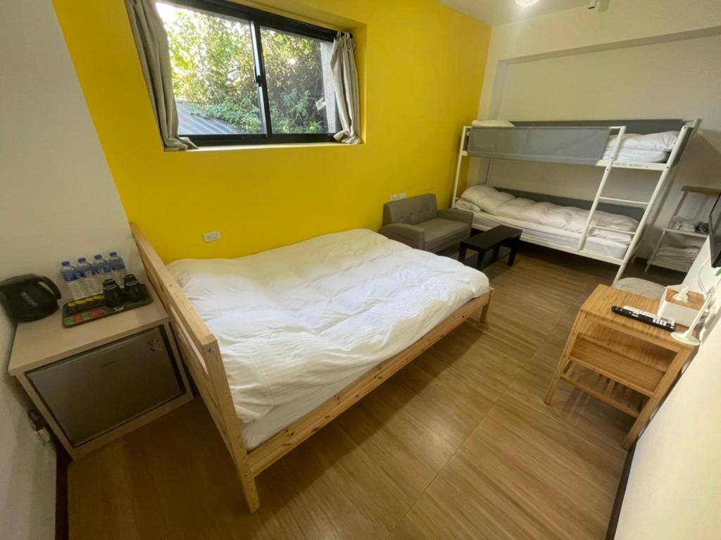 Postel nebo postele na pokoji v ubytování Lucky House B&B