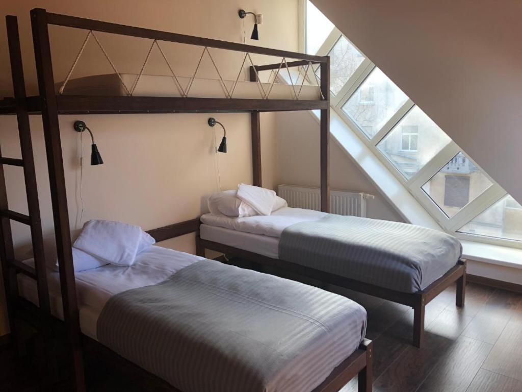 Postel nebo postele na pokoji v ubytování Rock'n'hostel