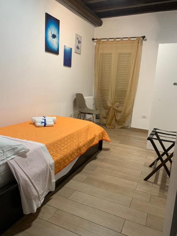 Posteľ alebo postele v izbe v ubytovaní Casa Vacanze Historic House