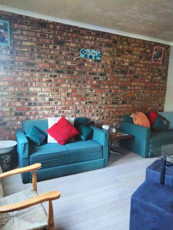 63 On Main - Apartamento Con Vista Al Jardín