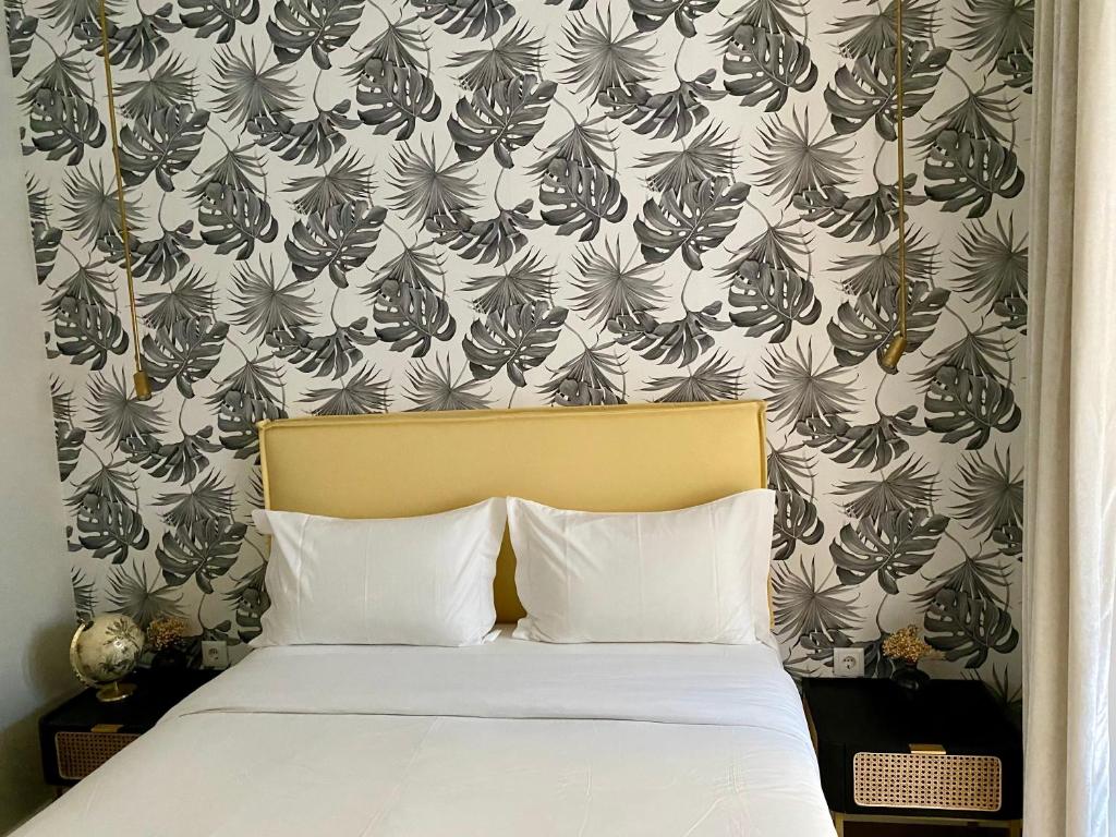 Een bed of bedden in een kamer bij Canarios Apartments Cardal - I
