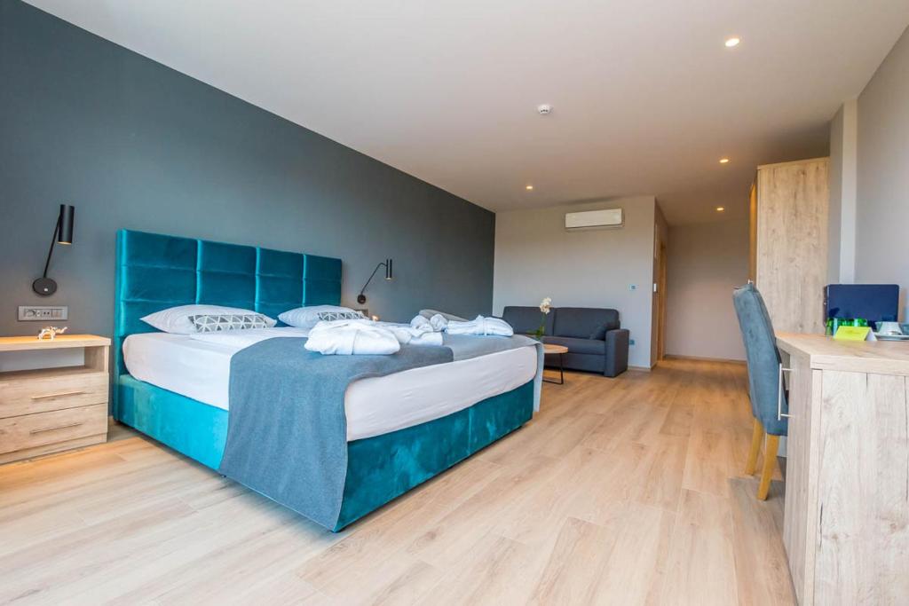 Postel nebo postele na pokoji v ubytování Hotel Delfin Lanterna