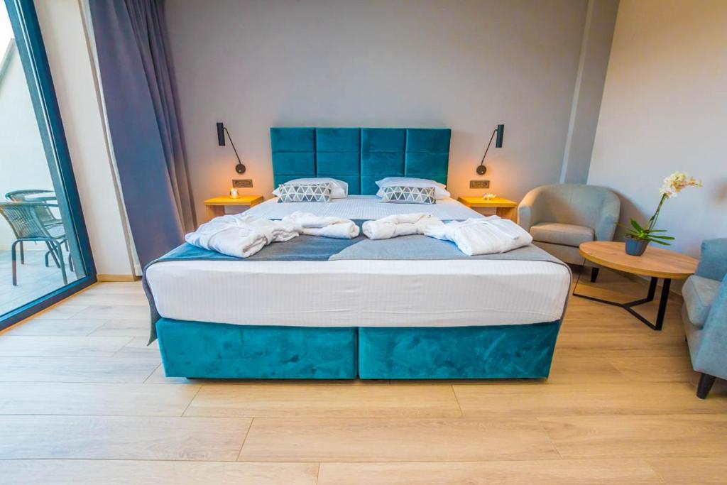 Postel nebo postele na pokoji v ubytování Hotel Delfin Lanterna