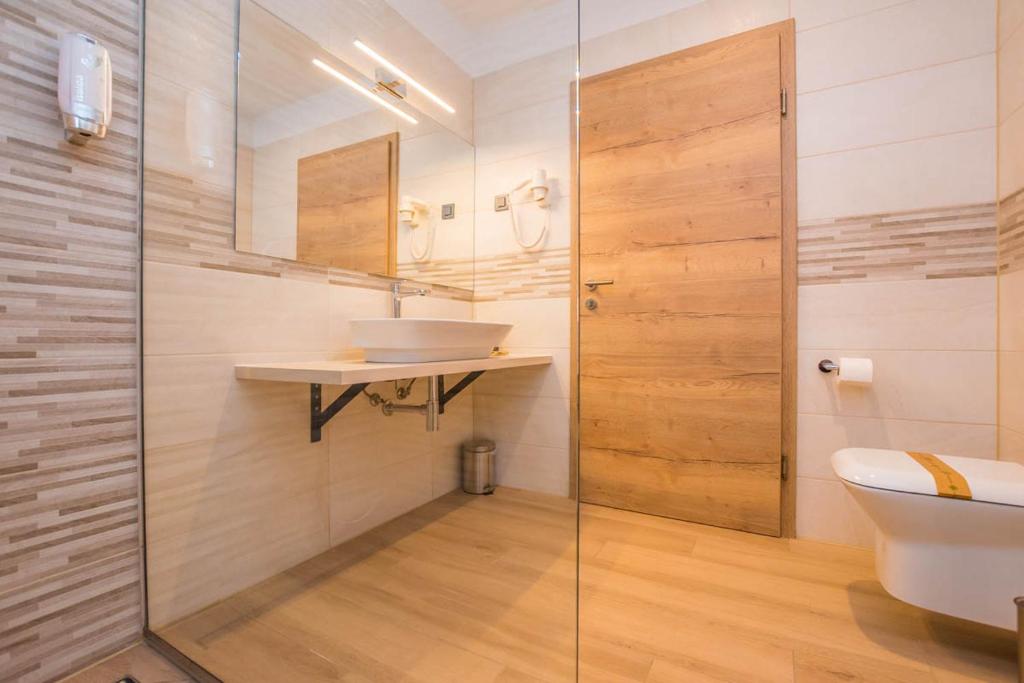 Koupelna v ubytování Hotel Delfin Lanterna