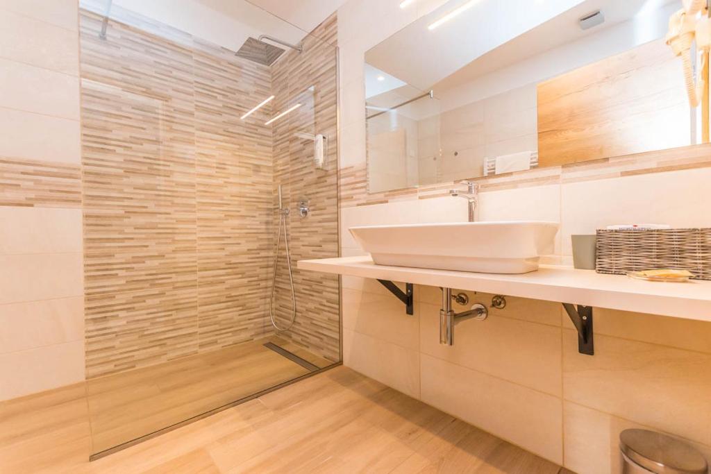 Koupelna v ubytování Hotel Delfin Lanterna