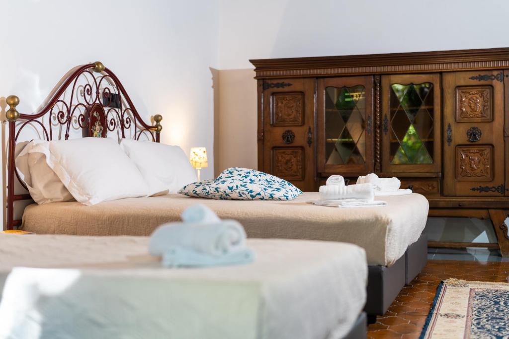 Postel nebo postele na pokoji v ubytování Agriturismo Costantino