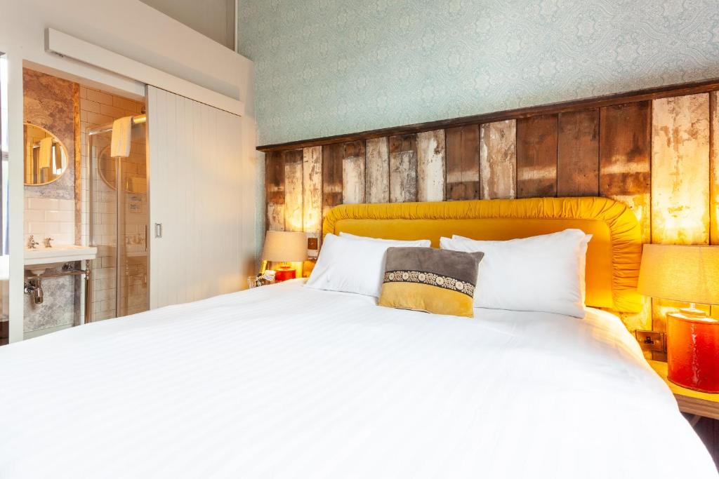 Ένα ή περισσότερα κρεβάτια σε δωμάτιο στο House Bedrooms Dublin