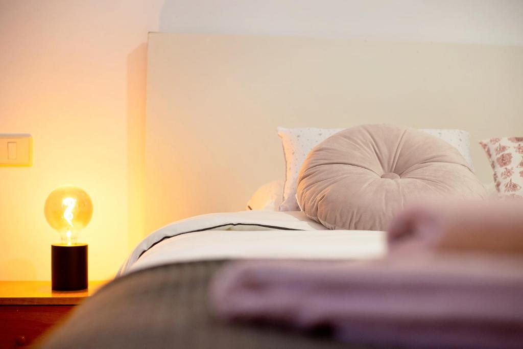 Łóżko lub łóżka w pokoju w obiekcie Apartamento Tanzanita