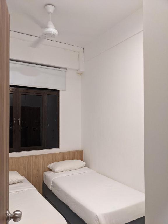 Postel nebo postele na pokoji v ubytování Alor Setar Imperio by IM Staycation 3bedroom & Rooftop Pool
