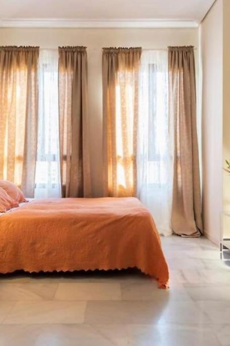 A bed or beds in a room at Penthouse O´Donell