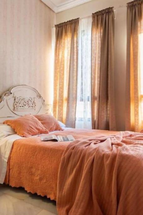 A bed or beds in a room at Penthouse O´Donell