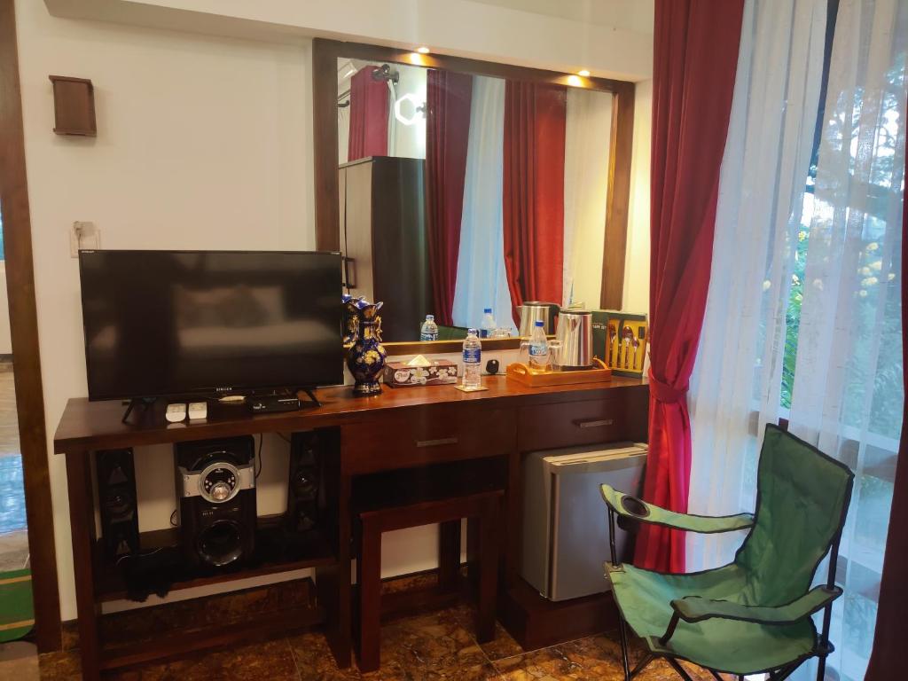 TV a/nebo společenská místnost v ubytování Y&Y Residence