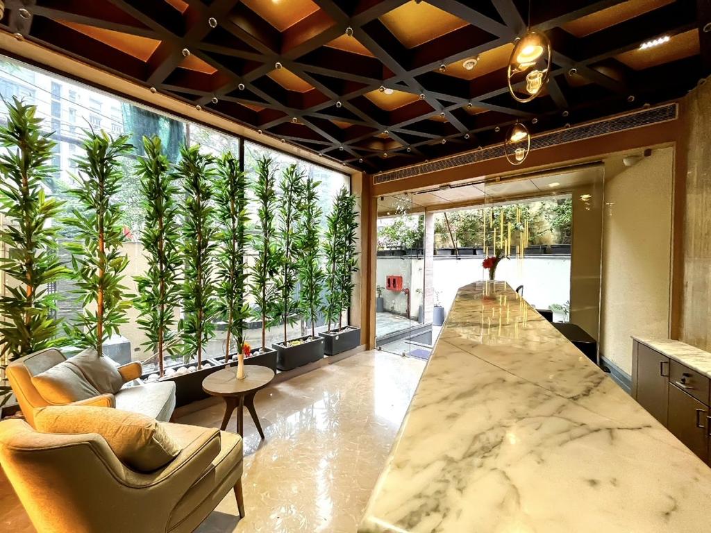 Posezení v ubytování Morvee Hotels Alipore Kolkata