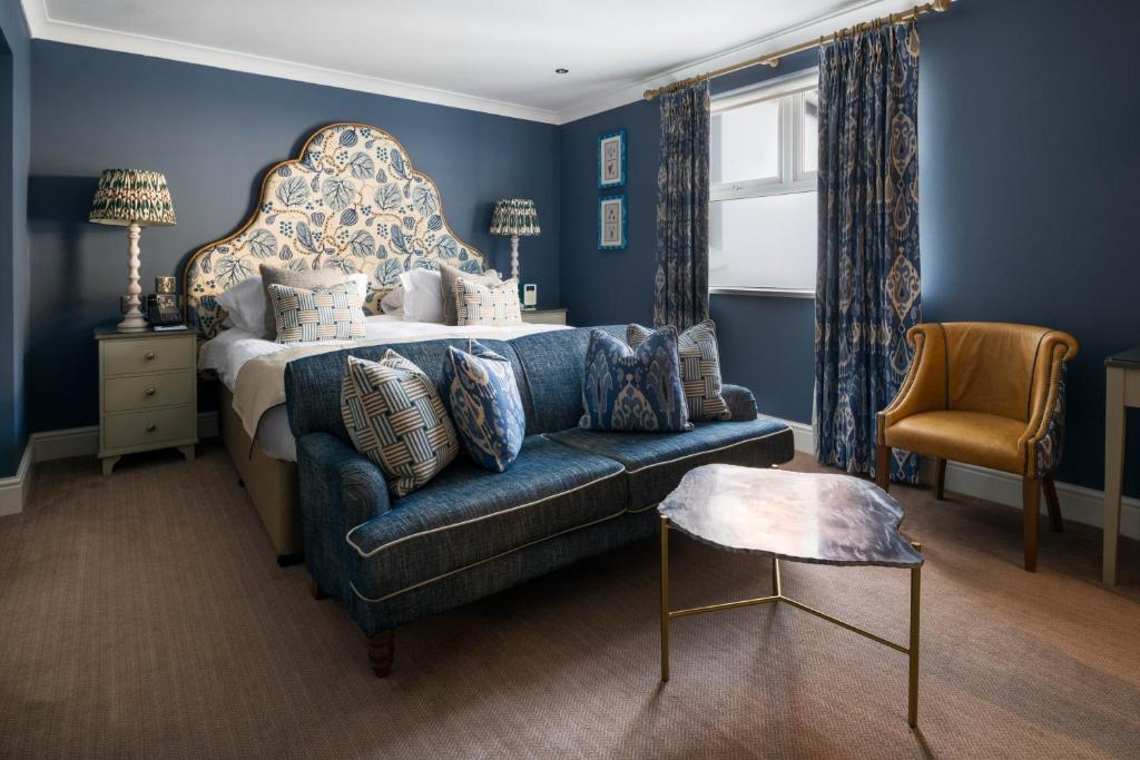 Кровать или кровати в номере The Headland Hotel and Spa