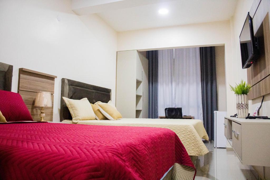 TV a/nebo společenská místnost v ubytování Liebling Hotel Ciudad del Este