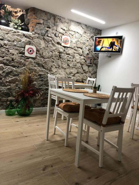 TV a/nebo společenská místnost v ubytování Solidea House