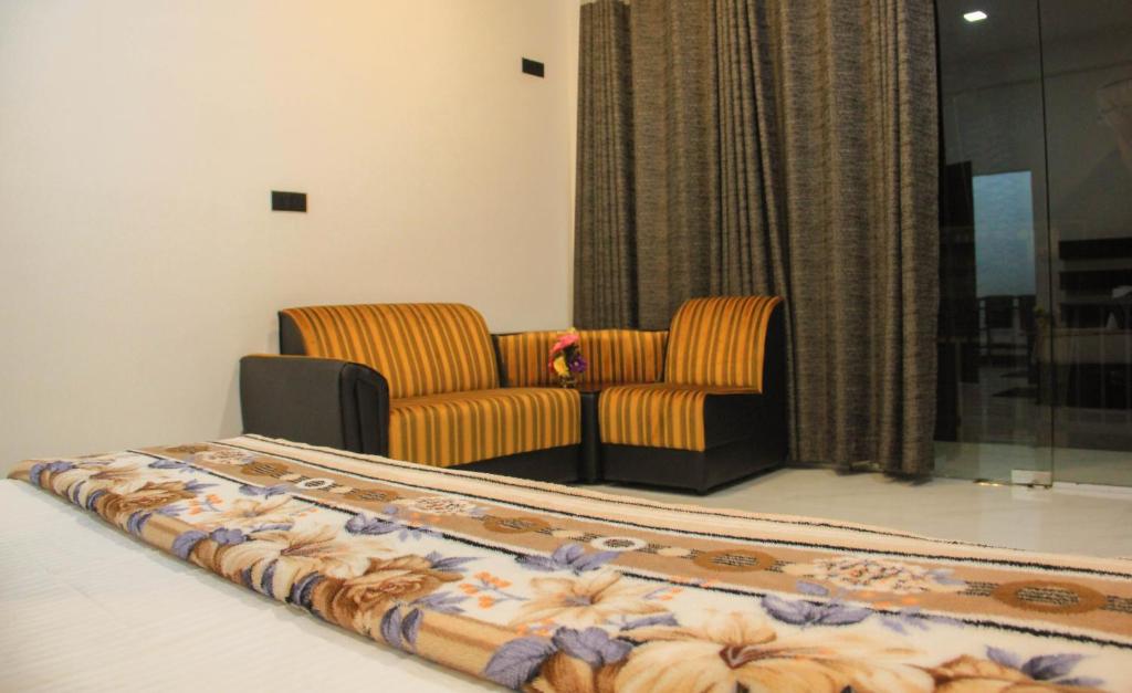 Posezení v ubytování Ella Odyssey Inn