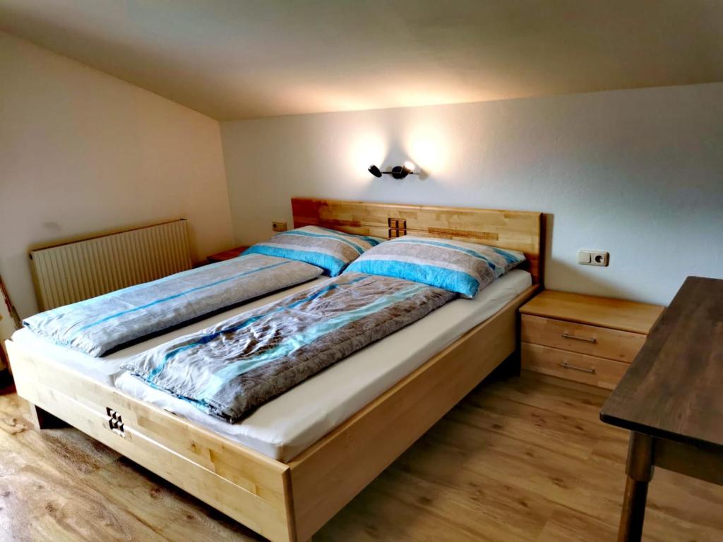 Postel nebo postele na pokoji v ubytování Ferienwohnungen Birkleiten