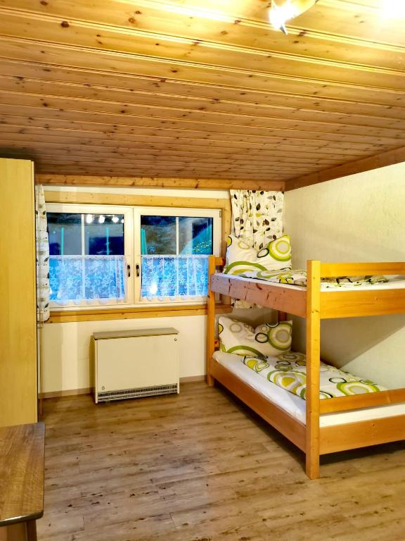Postel nebo postele na pokoji v ubytování Ferienwohnungen Birkleiten